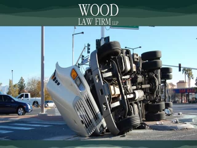 Overturned truck blocking intersection