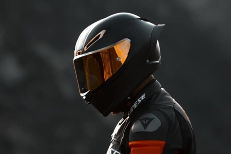 Motorcyclist wearing helmet