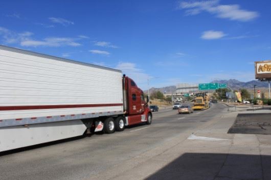 semi truck driving on the highway